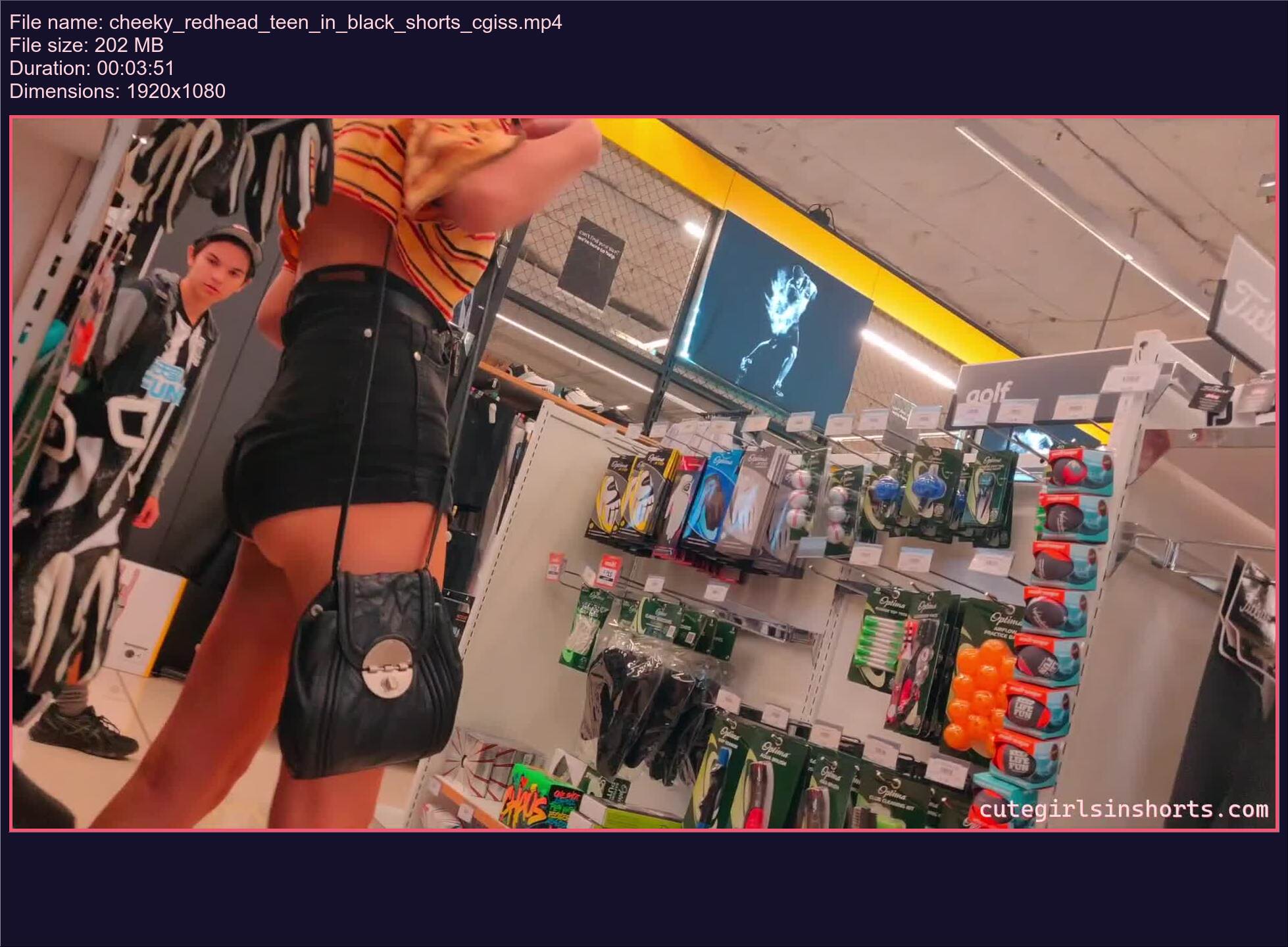 cheeky_redhead_teen_in_black_shorts_cgiss