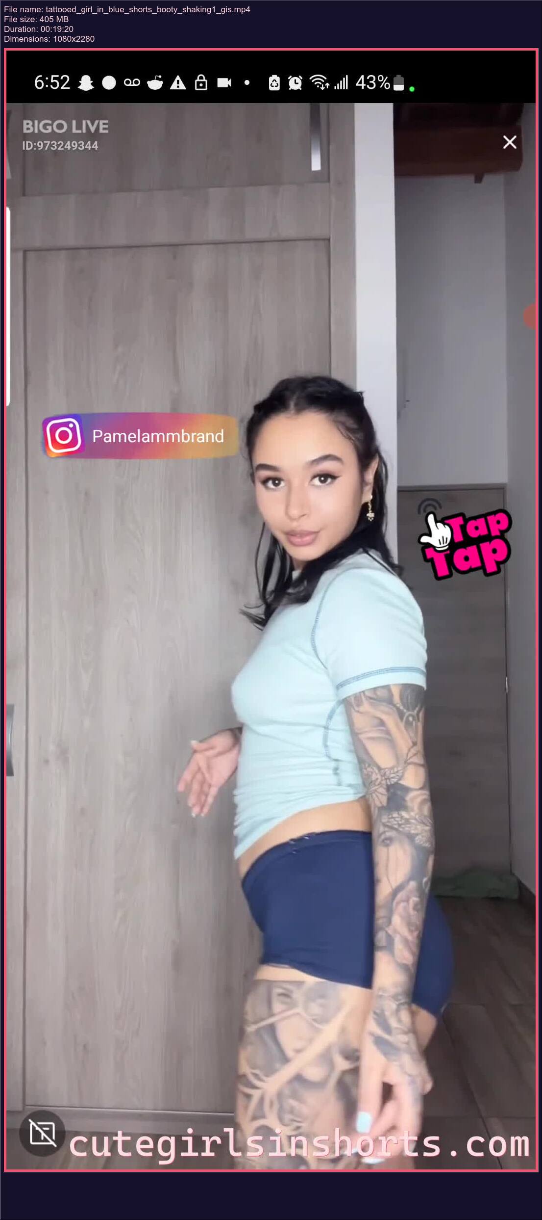 Tattooed Girl In Blue Shorts Booty Shaking 1