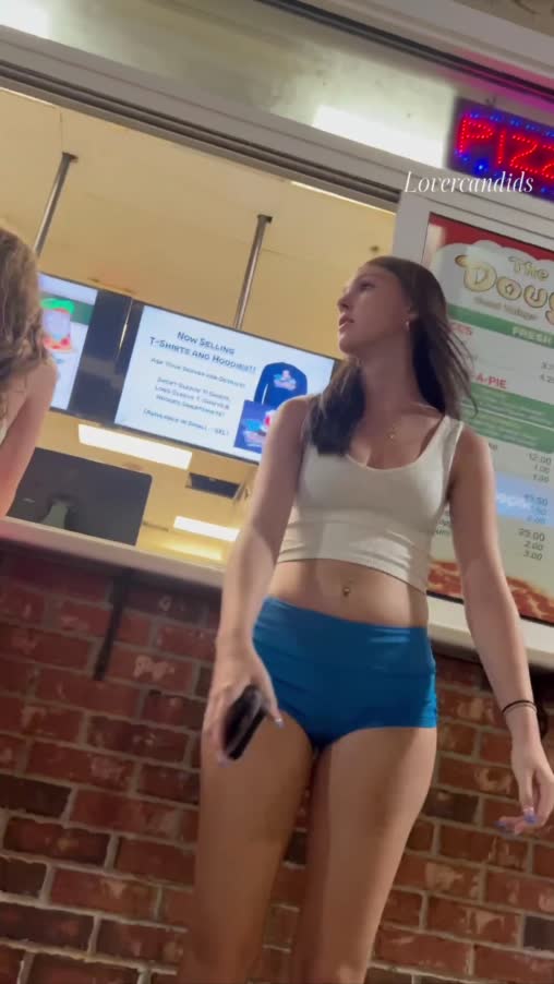 brunette_white_girl_in_blue_shorts_food_gis