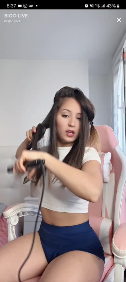 Gonga Brunette Latina Booty Shaking While Curling Hair 1